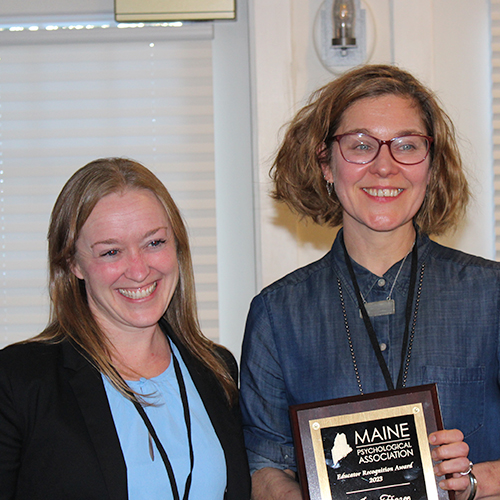 Board president Jamie Pratt with Educator of the Year winner, Jeni Frazee.